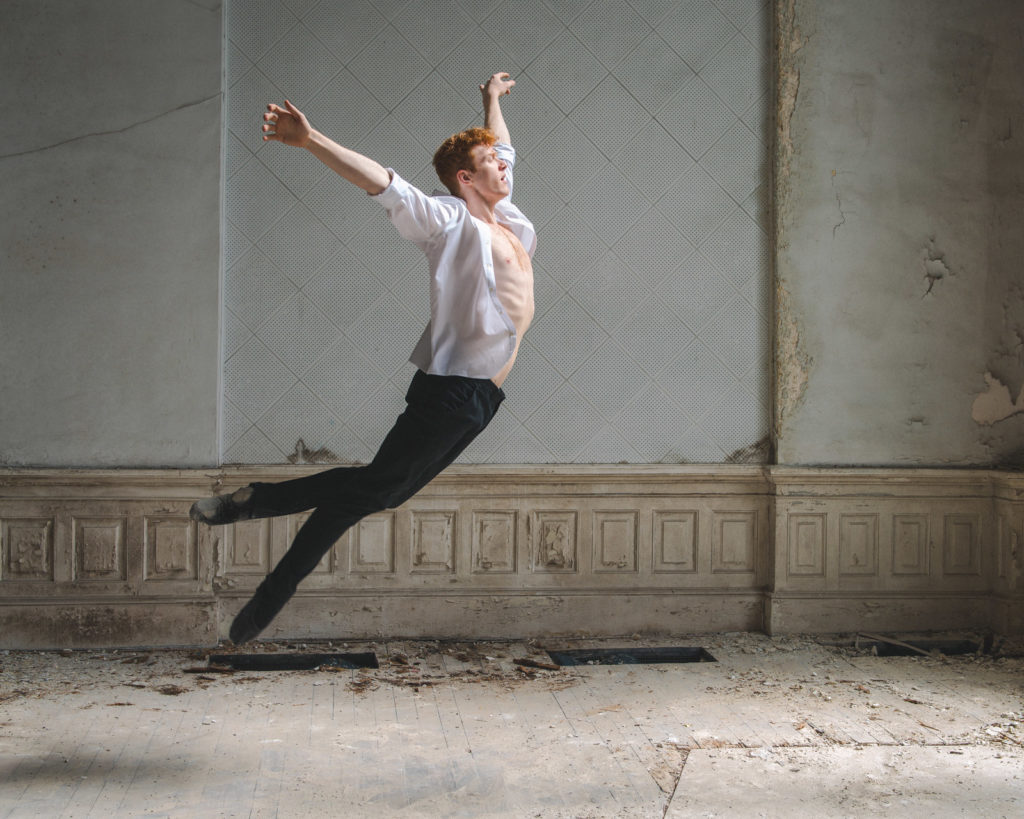 Ballet dancer Joshua leaps through the air.