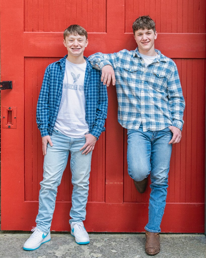 Two brothers pose together for family pictures at Columbia Riverfront Park.
